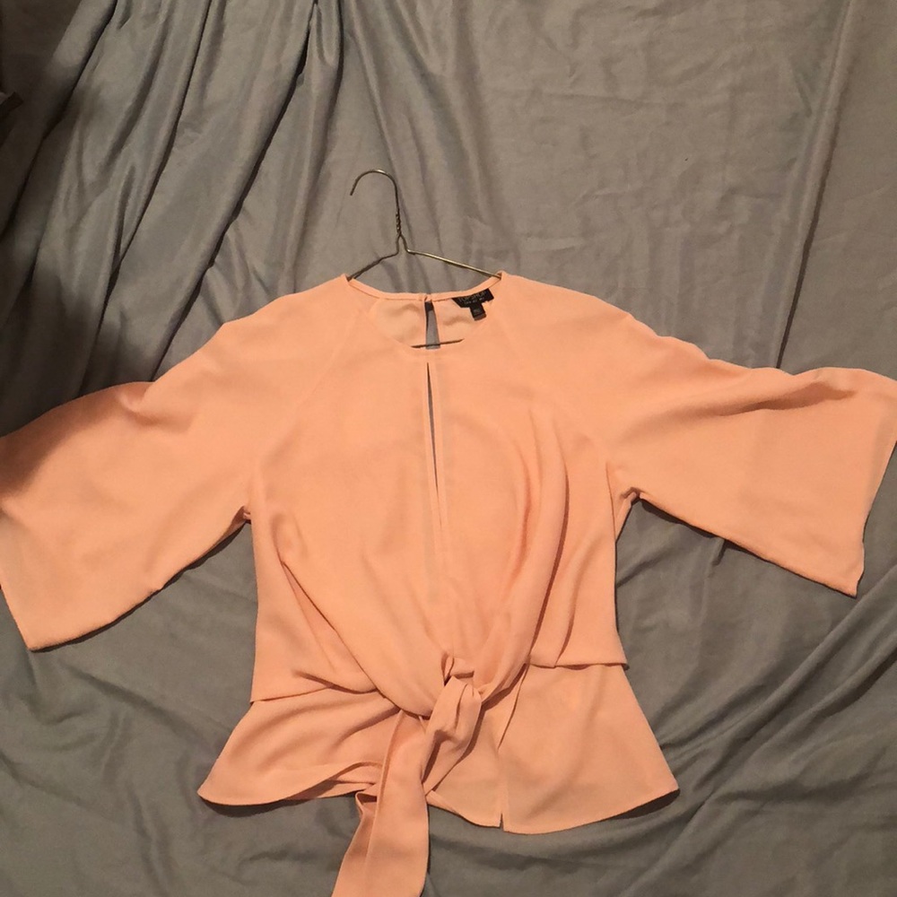 Pale pink/peach Topshop blouse with an open back